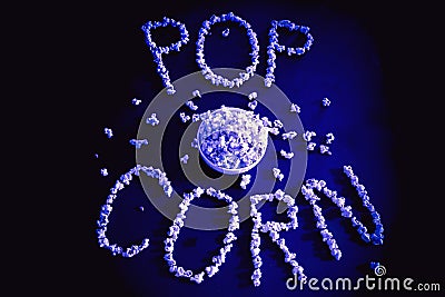 Popped Popcorn maize kernels and shaped in the word â€˜popcornâ€™ Stock Photo